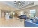 Open living space showcasing kitchen, living room and dining area at 14132 Campfire Ct, Parrish, FL 34219