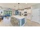 Open concept kitchen with large island and stainless steel appliances at 14132 Campfire Ct, Parrish, FL 34219
