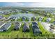 Aerial view of lakefront homes and community at 14132 Campfire Ct, Parrish, FL 34219