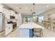 Open concept kitchen with large island and stainless steel appliances at 14132 Campfire Ct, Parrish, FL 34219