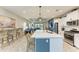 Open concept kitchen with large island and stainless steel appliances at 14132 Campfire Ct, Parrish, FL 34219