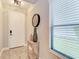 Bright entryway with a console table and large window at 14132 Campfire Ct, Parrish, FL 34219