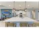 Open concept kitchen with large island and stainless steel appliances at 14132 Campfire Ct, Parrish, FL 34219