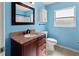 Bathroom with granite vanity and updated fixtures at 1661 Atwater Dr, North Port, FL 34288
