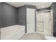 Bathroom with a bathtub and a separate shower at 1661 Atwater Dr, North Port, FL 34288
