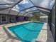 Relaxing screened pool area, perfect for outdoor enjoyment at 1661 Atwater Dr, North Port, FL 34288
