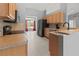 Well-equipped kitchen with modern appliances and ample counter space at 1661 Atwater Dr, North Port, FL 34288