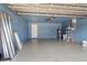 Spacious garage with ample storage space and painted walls at 1661 Atwater Dr, North Port, FL 34288