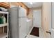 Laundry room with washer, dryer, and extra storage at 1661 Atwater Dr, North Port, FL 34288