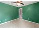 Bright bedroom with ceiling fan and carpet at 1661 Atwater Dr, North Port, FL 34288