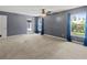 Bedroom with pool access and ceiling fan at 1661 Atwater Dr, North Port, FL 34288