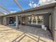 Covered patio with pool view and tile flooring at 1661 Atwater Dr, North Port, FL 34288