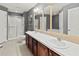 Bathroom with double sinks and a shower/tub combo at 1661 Atwater Dr, North Port, FL 34288