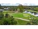 Aerial view of a lush green golf course at 2121 Tanglewood Dr, Sarasota, FL 34239