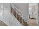 Clean interior staircase leading to upper level at 3119 Heatherwood Ln, Sarasota, FL 34235