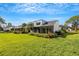 Contemporary home with green space and screened patio at 3119 Heatherwood Ln, Sarasota, FL 34235