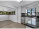 Modern kitchen with stainless steel appliances and granite countertops at 3119 Heatherwood Ln, Sarasota, FL 34235