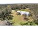 Aerial view of home showing its size and lot at 38603 Taylor Rd, Myakka City, FL 34251