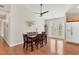 Charming dining area with hardwood floors and access to backyard at 38603 Taylor Rd, Myakka City, FL 34251