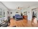 Main bedroom includes hardwood floors, ceiling fan, and private access at 38603 Taylor Rd, Myakka City, FL 34251
