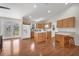 Kitchen with light wood cabinets and an island at 38603 Taylor Rd, Myakka City, FL 34251