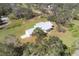 Aerial view showing home and surrounding landscape at 38603 Taylor Rd, Myakka City, FL 34251