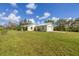 House with metal roof, garage and yard at 38603 Taylor Rd, Myakka City, FL 34251