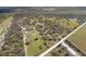Panoramic aerial shot of a large property featuring diverse landscapes, including wooded areas and open fields at 38603 Taylor Rd, Myakka City, FL 34251
