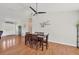 Bright dining room features hardwood floors and access to the outdoors at 38603 Taylor Rd, Myakka City, FL 34251