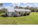 House with metal roof and large backyard at 38603 Taylor Rd, Myakka City, FL 34251