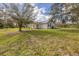 Single story home with metal roof and large yard at 38603 Taylor Rd, Myakka City, FL 34251