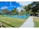 People playing pickleball on outdoor courts at 4416 Weybridge # 90, Sarasota, FL 34235