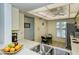 Kitchen boasts ample counter space and a breakfast nook at 4416 Weybridge # 90, Sarasota, FL 34235