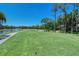 Golf course with water feature and lush greens at 4416 Weybridge # 90, Sarasota, FL 34235