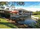 Community clubhouse with waterfront patio and gazebo at 4416 Weybridge # 90, Sarasota, FL 34235