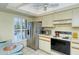 Kitchen features stainless steel appliances and breakfast nook at 4416 Weybridge # 90, Sarasota, FL 34235
