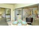 This inviting patio offers views into the living room and bedroom beyond at 4416 Weybridge # 90, Sarasota, FL 34235