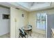 Kitchen nook with table and chairs, near a window at 4416 Weybridge # 90, Sarasota, FL 34235