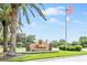 Community entrance with a welcoming sign featuring the community name at 4561 Murcia Blvd # 13, Sarasota, FL 34238