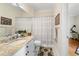 Simple bathroom with granite countertop and shower/tub combo at 4561 Murcia Blvd # 13, Sarasota, FL 34238