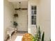 Inviting entryway with double doors and a bench at 4561 Murcia Blvd # 13, Sarasota, FL 34238