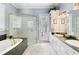 Elegant bathroom with double vanity and large shower at 4561 Murcia Blvd # 13, Sarasota, FL 34238