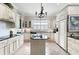 Large kitchen with granite countertops and stainless steel appliances at 4561 Murcia Blvd # 13, Sarasota, FL 34238