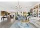Expansive living area showcasing an open floor plan and kitchen access at 4561 Murcia Blvd # 13, Sarasota, FL 34238