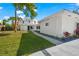 Modern home with a nicely landscaped side yard at 4915 Primrose Path, Sarasota, FL 34242