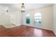 Bright dining room with hardwood floors and arched windows at 510 Border St, Port Charlotte, FL 33953