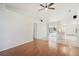 Living room with hardwood floors and access to the kitchen at 510 Border St, Port Charlotte, FL 33953