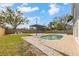 Inviting backyard oasis with a refreshing pool and pergola at 5321 13Th Avenue W Dr, Bradenton, FL 34209