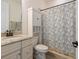 Bathroom with granite countertop and shower/tub combo at 5553 Mulligan Way, Bradenton, FL 34211