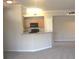 Kitchen features a breakfast bar and neutral decor at 5701 Soldier Cir # 104, Sarasota, FL 34233